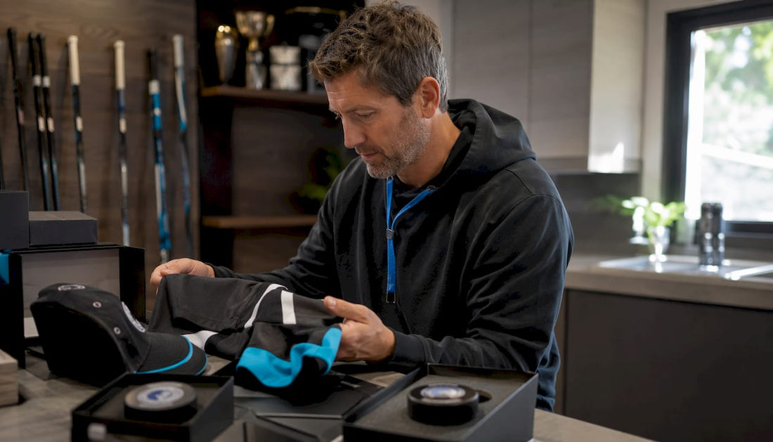 Hockey coach reviewing various gift items